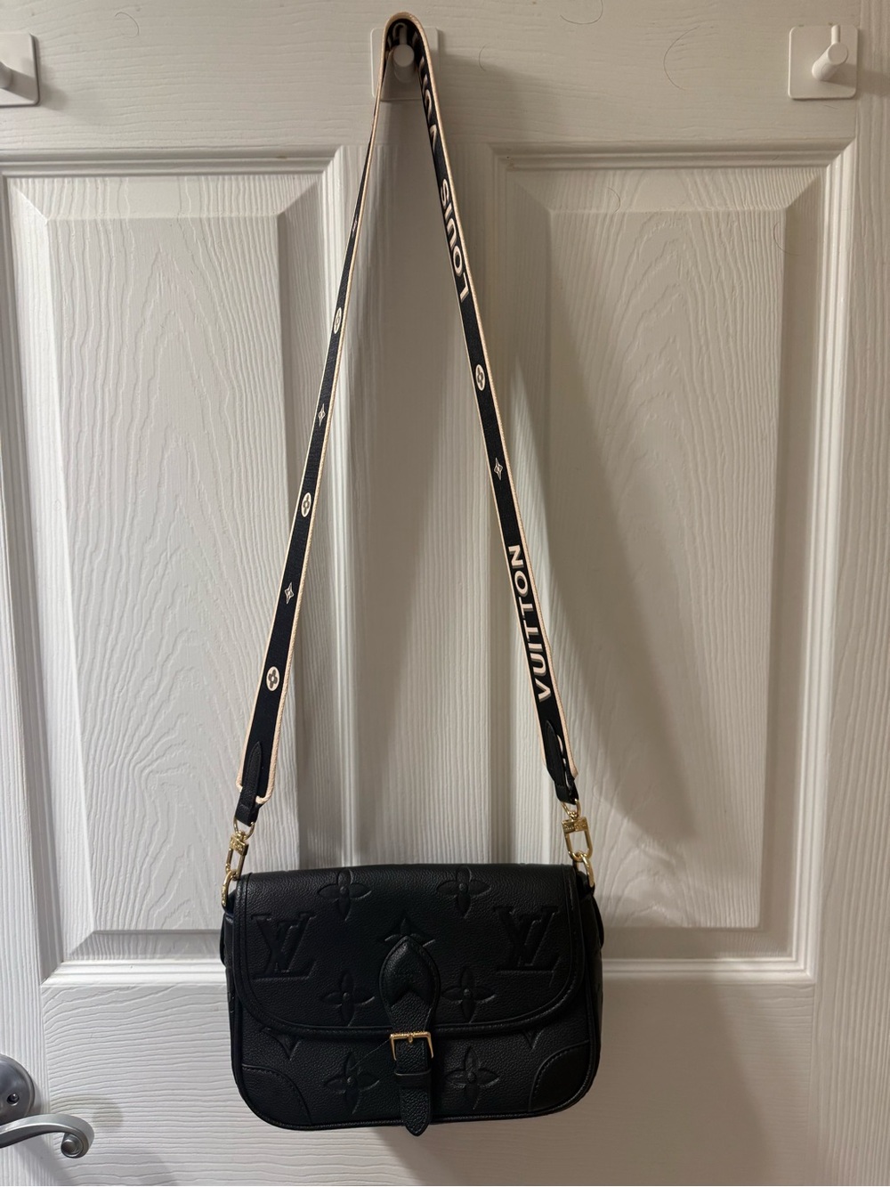 Source unknown Black Louis Vuitton Embossed Leather Crossbody Bag